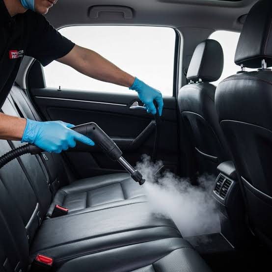 Steam treatment to remove smoke odor from a car interior
